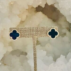 Elegant Black Quatrefoil Clover Stud Earrings featuring crystal halo setting